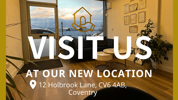 Eye-level view of a traditional Coventry street with terraced houses and a "For Sale" sign